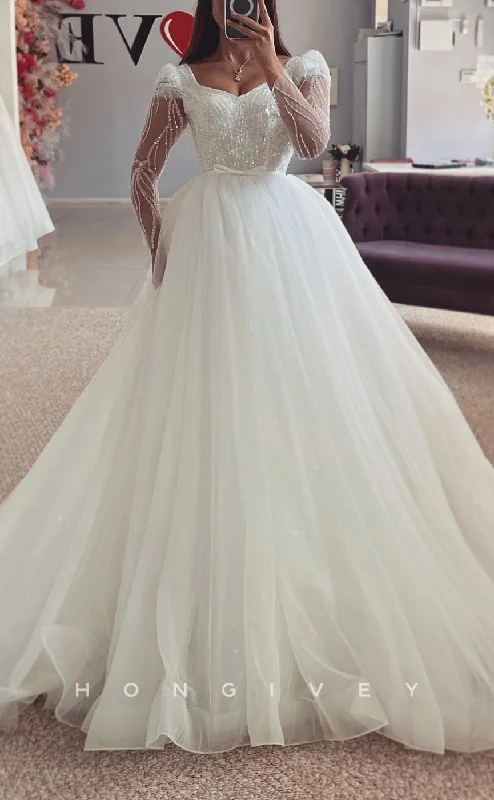 H1692 - Bateau Long Sleeve Sequined Appliques Empire Tulle Wedding Dress